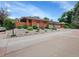 Lovely brick home with manicured landscaping and a two-car attached garage at 3481 S Race St, Englewood, CO 80113