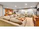 Spacious living room with neutral carpet, furniture, and decorations at 3481 S Race St, Englewood, CO 80113