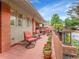 Inviting outdoor patio with comfortable seating, colorful potted plants, and a relaxed ambiance at 3481 S Race St, Englewood, CO 80113