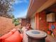 Brick patio with outdoor seating and cozy ambiance, perfect for relaxing and entertaining guests at 3481 S Race St, Englewood, CO 80113