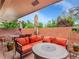 Inviting brick patio featuring comfortable seating, shade umbrellas, and a relaxed setting for outdoor enjoyment at 3481 S Race St, Englewood, CO 80113
