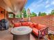 Cozy brick patio with a comfortable seating area, ideal for outdoor relaxation and gatherings at 3481 S Race St, Englewood, CO 80113