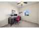 Bedroom featuring a ceiling fan, bright window and a desk at 1868 Homestead Dr, Fort Lupton, CO 80621