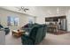 Spacious living room and kitchen are great for entertaining at 1868 Homestead Dr, Fort Lupton, CO 80621