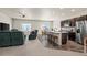 Spacious living room and kitchen are great for entertaining at 1868 Homestead Dr, Fort Lupton, CO 80621