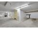 Spacious garage with parking spot and overhead lighting, ready for vehicle storage and convenience at 2500 E Cherry Creek South Dr # 116, Denver, CO 80209