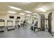 Community gym with treadmills, ellipticals, stationary bikes and weight machines at 2500 E Cherry Creek South Dr # 116, Denver, CO 80209