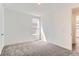 Bright bedroom with neutral carpeting at 647 Nightsky St, Erie, CO 80516