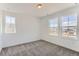 Inviting bedroom featuring natural light and neutral tones, creating a serene and comfortable atmosphere at 647 Nightsky St, Erie, CO 80516