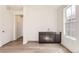 Bonus room featuring a built in wet bar with a sink, dark cabinets and a white countertop at 647 Nightsky St, Erie, CO 80516
