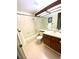 Bathroom featuring a vanity, sink, mirror, and combined shower-tub at 4996 S Gibraltar Way, Centennial, CO 80015