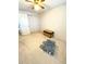 Empty bedroom featuring a large closet and carpeted floor at 4996 S Gibraltar Way, Centennial, CO 80015