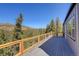 Large deck showcasing the great mountain view at 33884 Bergen View Trl, Evergreen, CO 80439