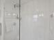 Sleek, modern shower with glass enclosure and rainfall showerhead at 7055 E Heritage S Pl, Centennial, CO 80111