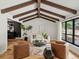 Bright living room featuring hardwood floors, exposed beams, natural light and contemporary decor at 7055 E Heritage S Pl, Centennial, CO 80111