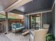 Relaxing covered patio boasts comfortable seating, stylish decor, and a tranquil outdoor ambiance at 7055 E Heritage S Pl, Centennial, CO 80111