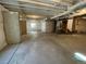 Unfinished basement with high ceilings and ample space at 4664 Windmill Dr, Thornton, CO 80601