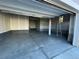 Spacious two-car garage with freshly painted floor at 4664 Windmill Dr, Thornton, CO 80601