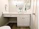 Bright powder room featuring a modern vanity and neutral color scheme at 14006 E Stanford Cir # K08, Aurora, CO 80015