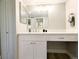Bathroom features vanity area with a sink, and built-in drawers and cabinets at 14006 E Stanford Cir # K08, Aurora, CO 80015