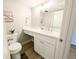 Stylish powder room with modern fixtures, ample lighting, and a clean design at 14006 E Stanford Cir # K08, Aurora, CO 80015