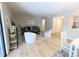 Bright living room featuring wood floors, modern furniture, and neutral tones at 14006 E Stanford Cir # K08, Aurora, CO 80015