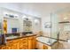 Elegant bathroom with double vanity, soaking tub, and glass-enclosed tiled shower at 10762 W 54Th Pl, Arvada, CO 80002