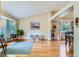 Inviting living room with hardwood floors, neutral colors, and plenty of natural light at 10762 W 54Th Pl, Arvada, CO 80002
