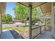 Inviting front porch with a view of the lush front yard and neighborhood street at 10762 W 54Th Pl, Arvada, CO 80002
