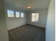 Bright bedroom featuring neutral walls and carpet at 12937 Range St, Firestone, CO 80504