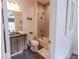 Bathroom featuring soaking tub, single vanity, and modern fixtures at 1884 Ford St, Golden, CO 80401