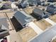 Aerial view of a house with a long driveway and a well-maintained yard at 42338 Forest Oaks Dr, Elizabeth, CO 80107