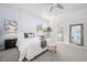 Bright and airy bedroom with ensuite bathroom, large mirror, and neutral decor at 42338 Forest Oaks Dr, Elizabeth, CO 80107