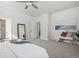 Spacious main bedroom with ample natural light, ensuite bathroom, and neutral paint at 42338 Forest Oaks Dr, Elizabeth, CO 80107