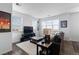 Cozy living room with multiple windows, comfortable seating, and stylish décor at 4680 Copeland Loop # 204, Highlands Ranch, CO 80126