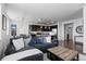 Bright and open living space combining living, dining, and kitchen areas with modern finishes at 4680 Copeland Loop # 204, Highlands Ranch, CO 80126