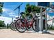 Close-up of red bike-share bicycles at a station, showcasing accessibility and urban mobility at 2405 W 39Th Ave, Denver, CO 80211