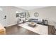Bright living area featuring a large window, comfortable seating, and stylish décor at 2405 W 39Th Ave, Denver, CO 80211