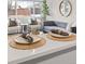 Bright living room featuring modern furnishings and natural light from a large window at 2405 W 39Th Ave, Denver, CO 80211