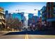 A street in a vibrant city, showcasing modern architecture and urban charm at 2405 W 39Th Ave, Denver, CO 80211