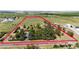 Large parcel of land, with approximate property lines, showcasing a log home and open fields at 2965 Wagner St, Strasburg, CO 80136