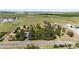 Expansive property featuring a charming log home, outbuildings, and large open fields at 2965 Wagner St, Strasburg, CO 80136