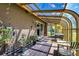 Relaxing sunroom with glass roof and tile floor at 2965 Wagner St, Strasburg, CO 80136