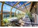 Enclosed sunroom with table, chairs and hot tub at 2965 Wagner St, Strasburg, CO 80136