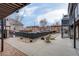 Spacious courtyard with seating areas, a fire pit, and access to the building at 120 S Pennsylvania St # 302, Denver, CO 80209