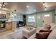 Inviting living room featuring modern decor and a comfortable couch, perfect for relaxation at 120 S Pennsylvania St # 302, Denver, CO 80209