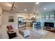 Open living space with a stylish kitchen, comfortable seating, and modern appliances at 120 S Pennsylvania St # 302, Denver, CO 80209