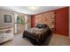 Charming bedroom with unique decor, shelving, and cozy furnishings at 8722 S Ault Ln, Morrison, CO 80465
