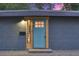 Charming home featuring a stylish front door with rustic wooden accents and unique exterior brickwork at 1024 Stuart St, Denver, CO 80204