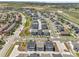 A Primary-planned community showcasing modern townhomes and landscaped green spaces at 12738 Boggs St, Parker, CO 80134